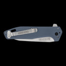 Gerber Fastball Clip Folding knife  with a matte slate blue-gray handle and a silver stainless steel blade, shown open against a solid black background.